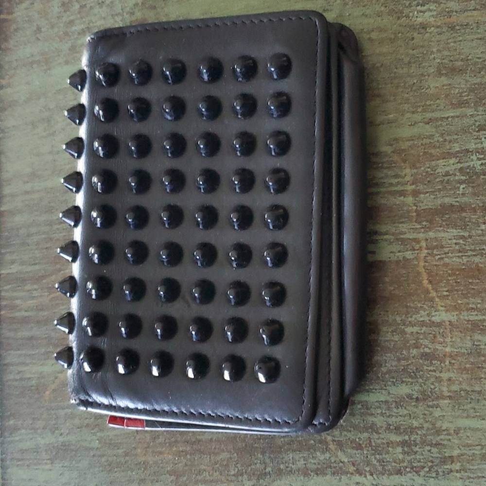 Christian Louboutin spiked fold over wallet